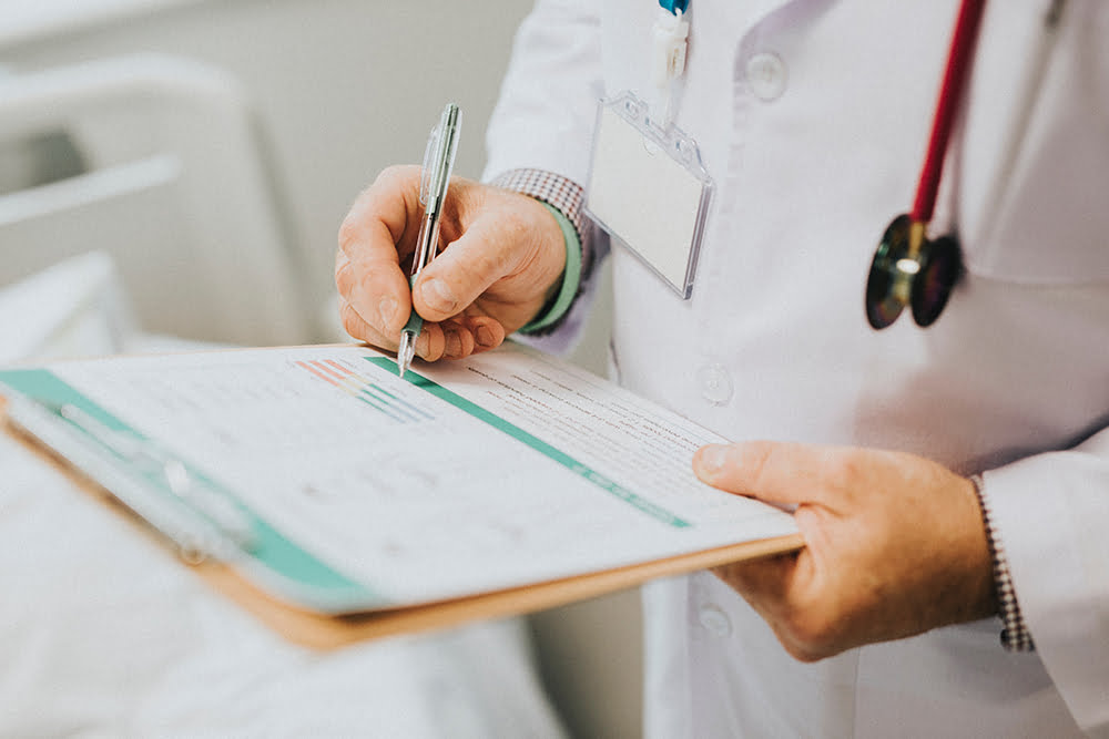 Doctor holding clipboard