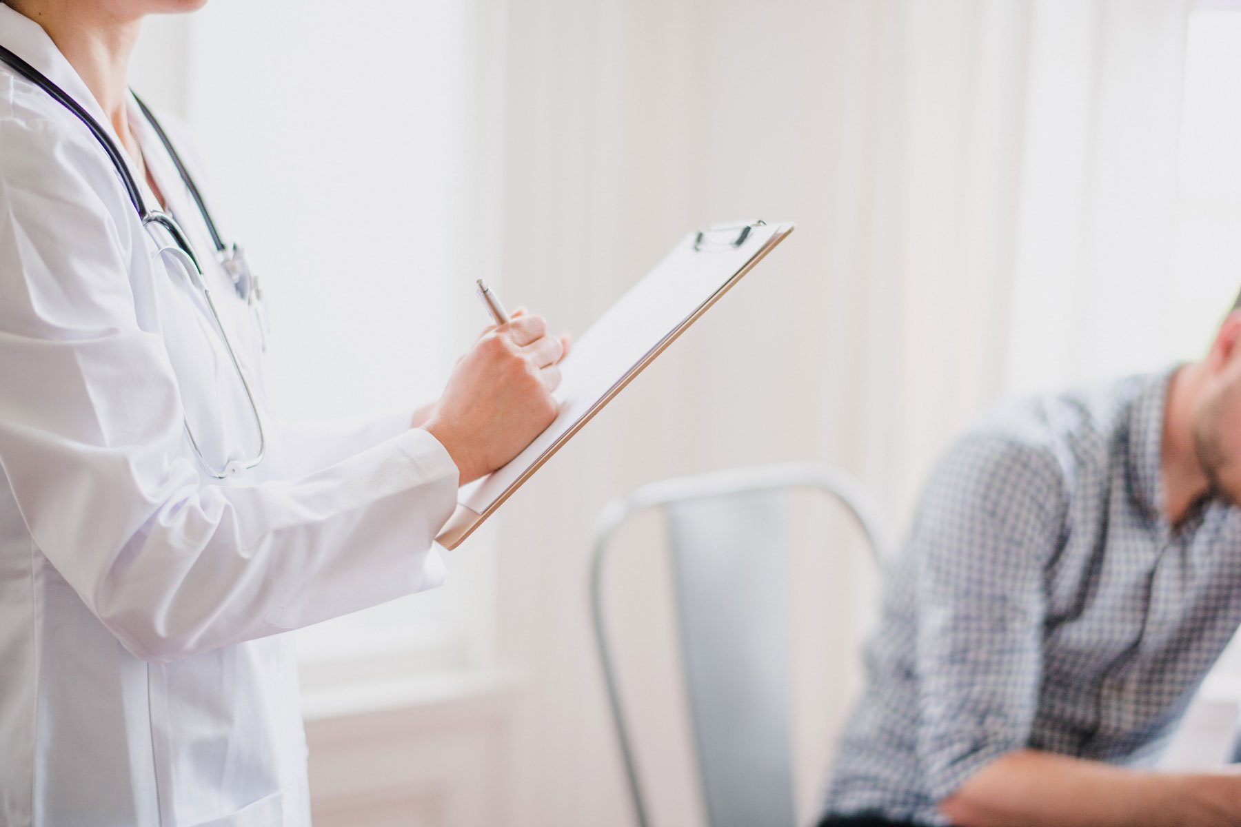 Doctor holding clipboard